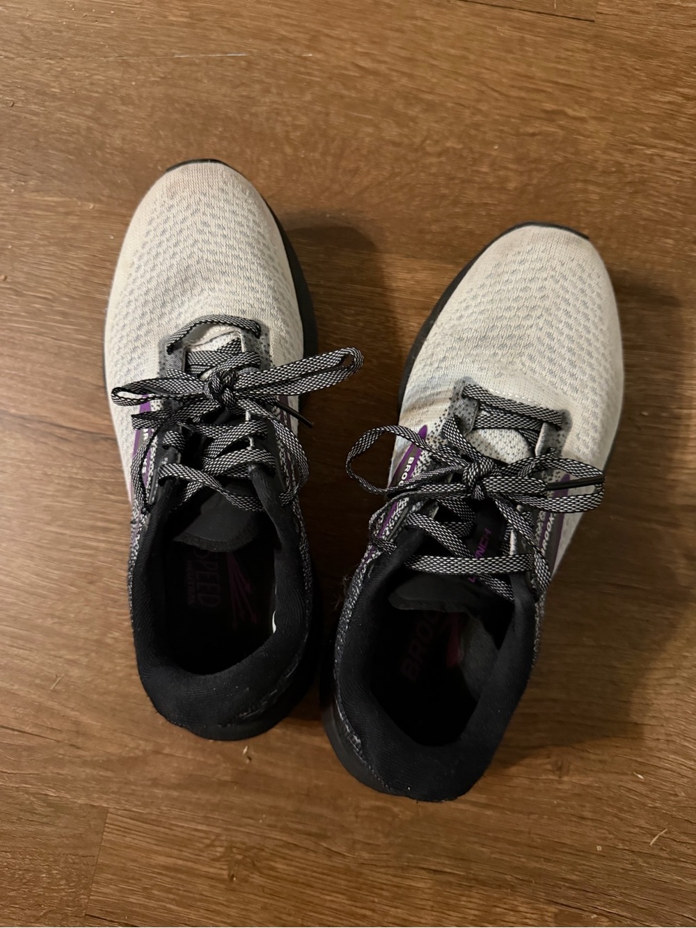 Brooks Women’s Cream and Black Running Sneakers with Subtle Purple Accents